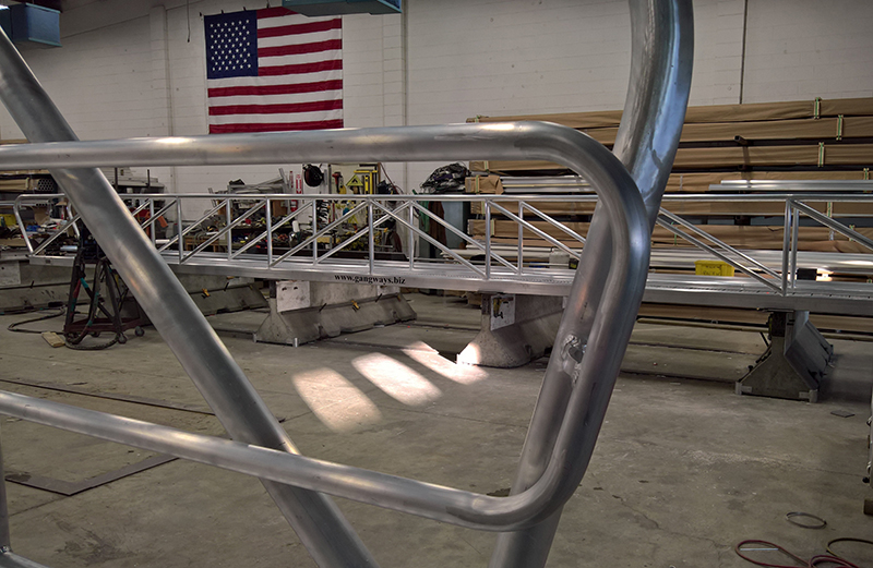 Here is an example of a custom wood and aluminum ADA handrail.