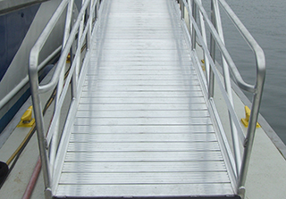 ADA handrails can be added to our aluminum gangways.