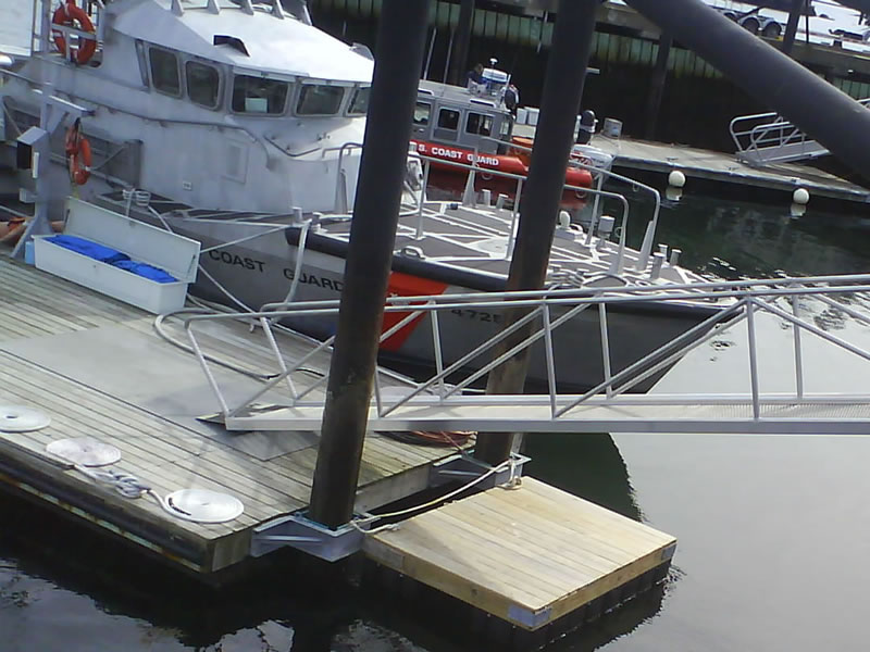 Aluminum brow at Coast Guard Station, Gloucester, MA. This brow uses i-Bar grating to allow snow and ice to fall through.