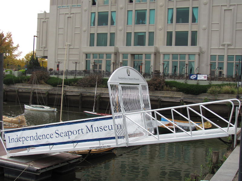 Aluminum gangway from shore to dolphin.